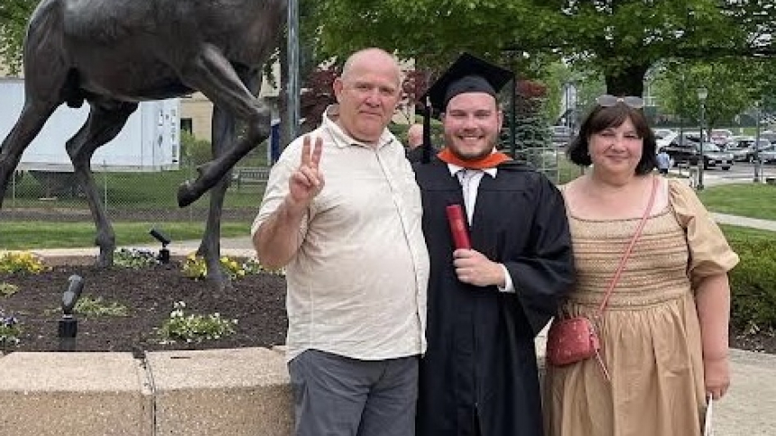 Kosta (C18) and his parents. 